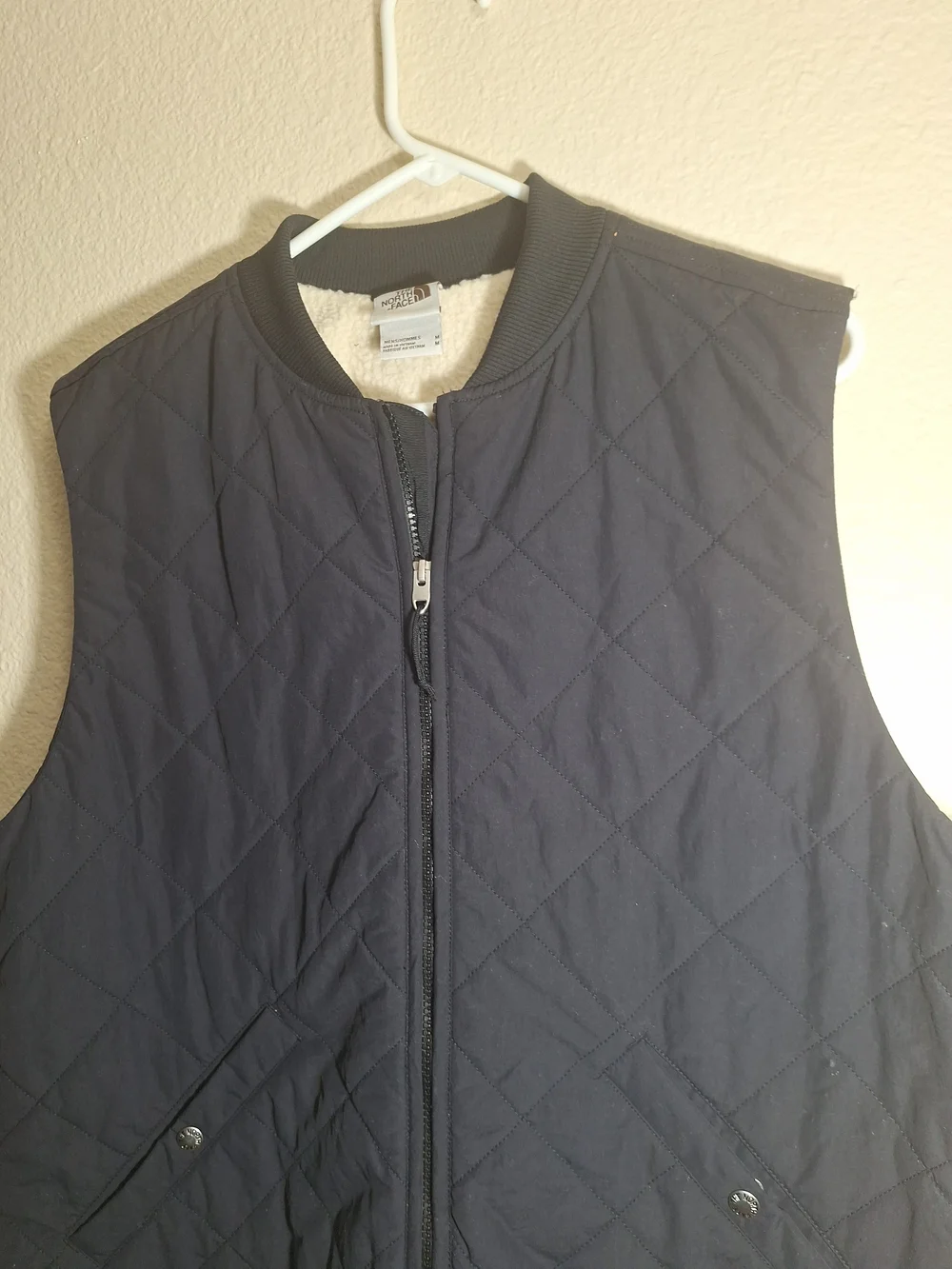 The North Face Black Quilted Vest with Sherpa Lining